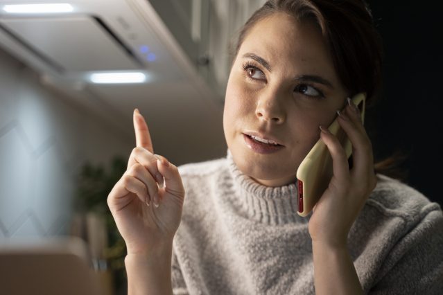 woman using smartphone as habit (1)